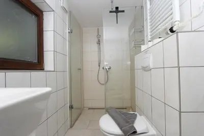 Ein Badezimmer in der Unterkunft Kajüte im Reethus