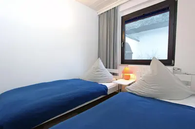 Ein Bett oder Betten in einem Zimmer der Unterkunft Koje im Reethus