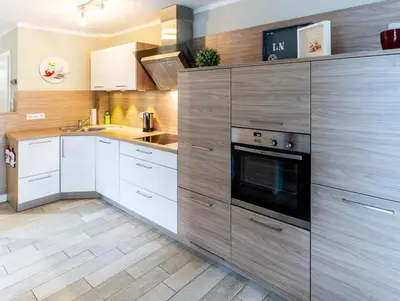 Küche/Küchenzeile in der Unterkunft Ferienwohnung Strandgut - Kavelweg 9 - Zingst
