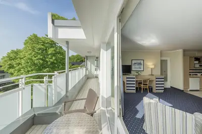 Ein Balkon oder eine Terrasse in der Unterkunft Grevenburg an der Seebrücke Zingst
