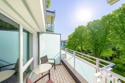 Ein Balkon oder eine Terrasse in der Unterkunft Grevenburg an der Seebrücke Zingst