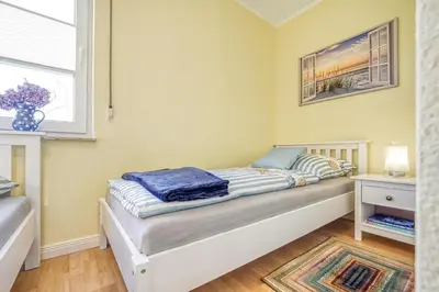 Ein Bett oder Betten in einem Zimmer der Unterkunft An der alten Rotbuche 02