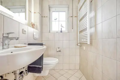 Ein Badezimmer in der Unterkunft An der alten Rotbuche 02