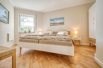 Ein Bett oder Betten in einem Zimmer der Unterkunft An der alten Rotbuche 02