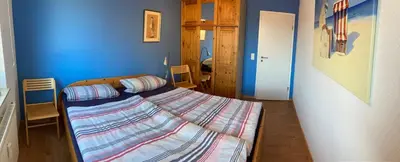 Ein Bett oder Betten in einem Zimmer der Unterkunft Friedensstraße 41 Wohng 12