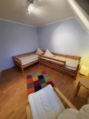 Ein Bett oder Betten in einem Zimmer der Unterkunft Friedensstraße 41 Wohng 12