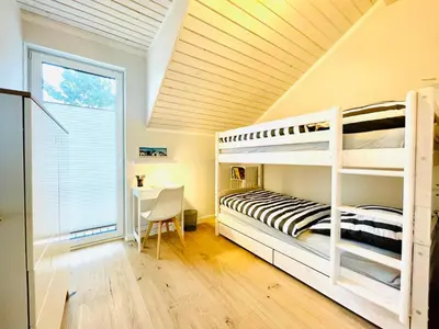 Ein Bett oder Betten in einem Zimmer der Unterkunft DarssAhoi