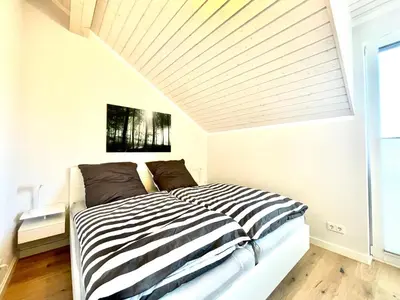 Ein Bett oder Betten in einem Zimmer der Unterkunft DarssAhoi