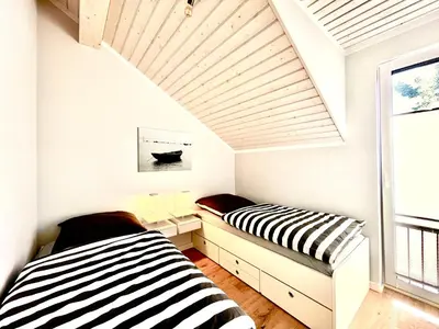 Ein Bett oder Betten in einem Zimmer der Unterkunft DarssAhoi