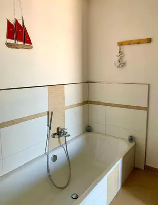 Ein Badezimmer in der Unterkunft Dachloft MEERzeit