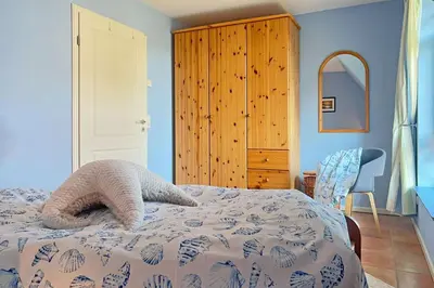 Ein Bett oder Betten in einem Zimmer der Unterkunft Ferienhaus Friederike