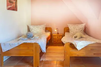 Ein Bett oder Betten in einem Zimmer der Unterkunft Ferienhaus Friederike