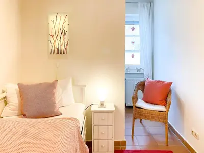 Ein Bett oder Betten in einem Zimmer der Unterkunft Moin Moin