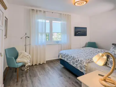 Ein Bett oder Betten in einem Zimmer der Unterkunft Seewind