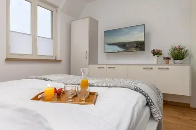 Ein Bett oder Betten in einem Zimmer der Unterkunft Ostseehaus Erika-Maria