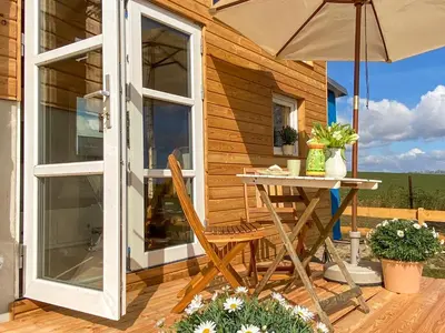 Ein Balkon oder eine Terrasse in der Unterkunft Tiny House Hygge
