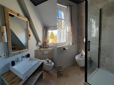 Ein Badezimmer in der Unterkunft BooHouse