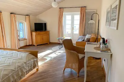 Ein Bett oder Betten in einem Zimmer der Unterkunft Pension Walfischhaus