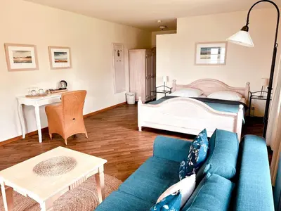 Ein Bett oder Betten in einem Zimmer der Unterkunft Pension Walfischhaus