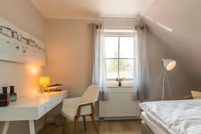 Ein Bett oder Betten in einem Zimmer der Unterkunft An de Dün