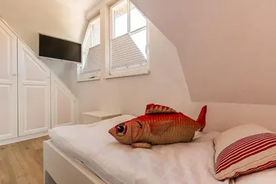 Ein Bett oder Betten in einem Zimmer der Unterkunft An de Dün