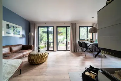 Ein Sitzbereich in der Unterkunft Haus Löwenzahn - waldnah mit Kamin & Sauna