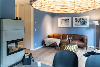 Ein Sitzbereich in der Unterkunft Haus Löwenzahn - waldnah mit Kamin & Sauna