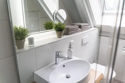 Ein Badezimmer in der Unterkunft Haus Löwenzahn - waldnah mit Kamin & Sauna