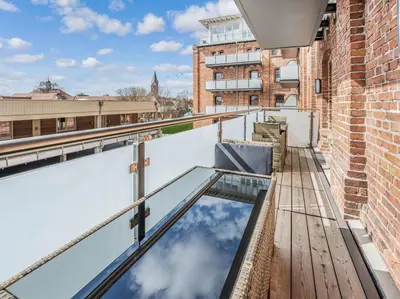 Ein Balkon oder eine Terrasse in der Unterkunft Speicher Hafendomizil