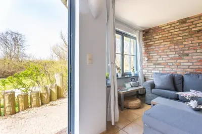 Ein Sitzbereich in der Unterkunft Strandhaus Wustrow - Wohnung 1
