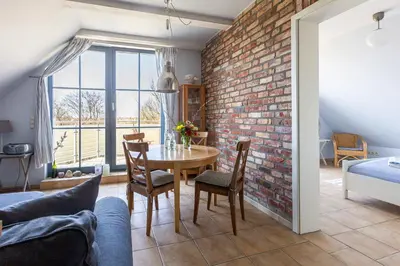 Ein Bett oder Betten in einem Zimmer der Unterkunft Strandhaus Wustrow - Wohnung 3