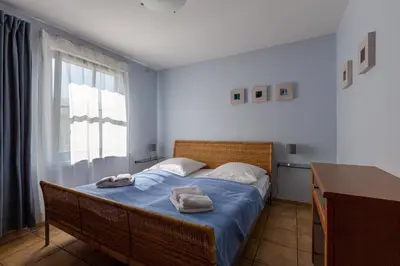 Ein Bett oder Betten in einem Zimmer der Unterkunft Strandhaus Wustrow - Wohnung 4