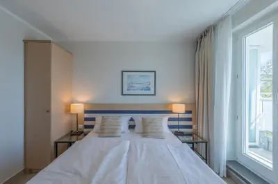 Ein Bett oder Betten in einem Zimmer der Unterkunft Bina im Ostseeheilbad Zingst