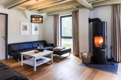 Ein Sitzbereich in der Unterkunft Akelei - Sauna, Kamin & Balkon