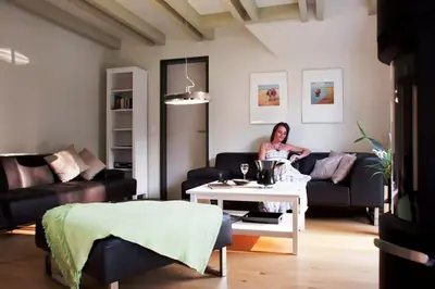 Ein Sitzbereich in der Unterkunft Akelei - Sauna, Kamin & Balkon
