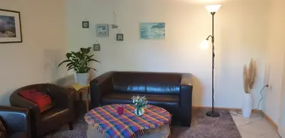 Ein Sitzbereich in der Unterkunft Haus Lenelies