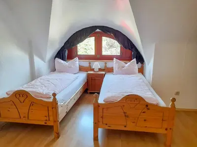 Ein Bett oder Betten in einem Zimmer der Unterkunft Ferienwohnung Seekiste
