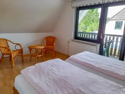 Ein Bett oder Betten in einem Zimmer der Unterkunft Ferienwohnung Seekiste