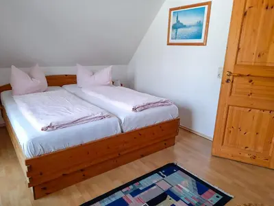 Ein Bett oder Betten in einem Zimmer der Unterkunft Ferienwohnung Seekiste