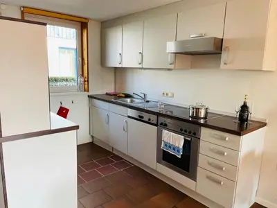 Küche/Küchenzeile in der Unterkunft Austernfischer Prerow - Schönes Ferienhaus in Toplage mit großem Garten für Familie und Freunde