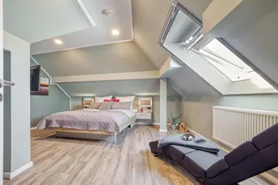Ein Bett oder Betten in einem Zimmer der Unterkunft Strandstraße 16 - Wohnung 6
