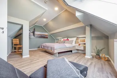 Ein Bett oder Betten in einem Zimmer der Unterkunft Strandstraße 16 - Wohnung 6