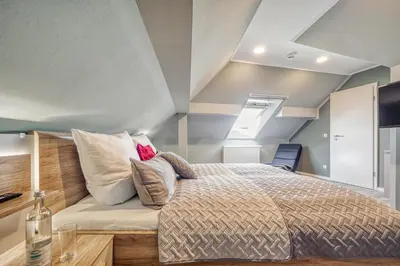 Ein Bett oder Betten in einem Zimmer der Unterkunft Strandstraße 16 - Wohnung 6