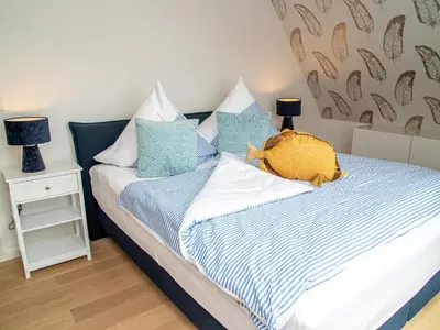 Ein Bett oder Betten in einem Zimmer der Unterkunft 
