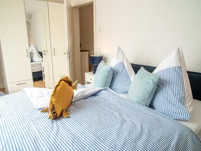 Ein Bett oder Betten in einem Zimmer der Unterkunft 