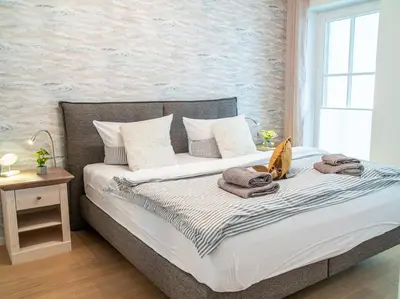 Ein Bett oder Betten in einem Zimmer der Unterkunft 