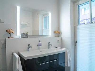 Ein Badezimmer in der Unterkunft 
