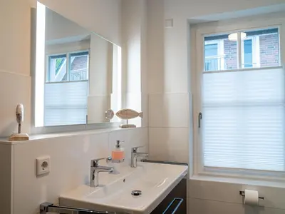 Ein Badezimmer in der Unterkunft 