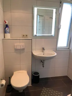 Ein Badezimmer in der Unterkunft Ferienwohnung OstseeStrandLäufer 1