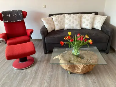 Ein Sitzbereich in der Unterkunft Ferienwohnung OstseeStrandLäufer 1